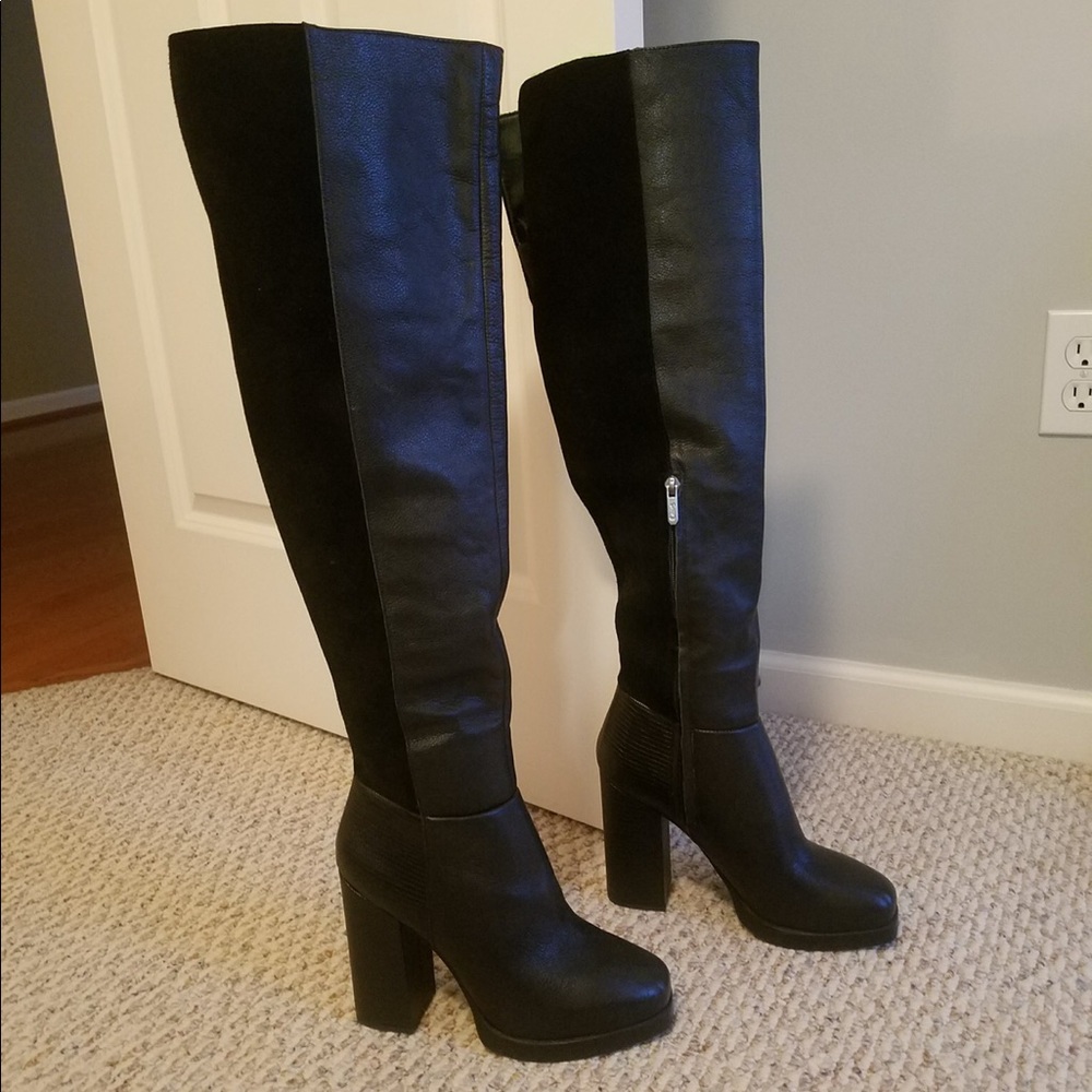 Knee high healed boots